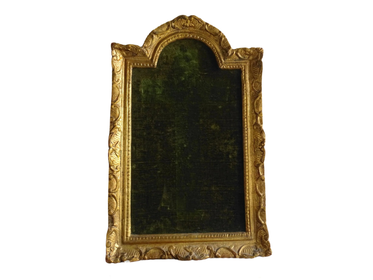 French antique gold frame with green velvet. Antique gilt wood frame with arched top.