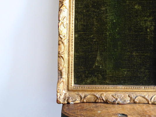 French antique gold frame with green velvet. Antique gilt wood frame with arched top.