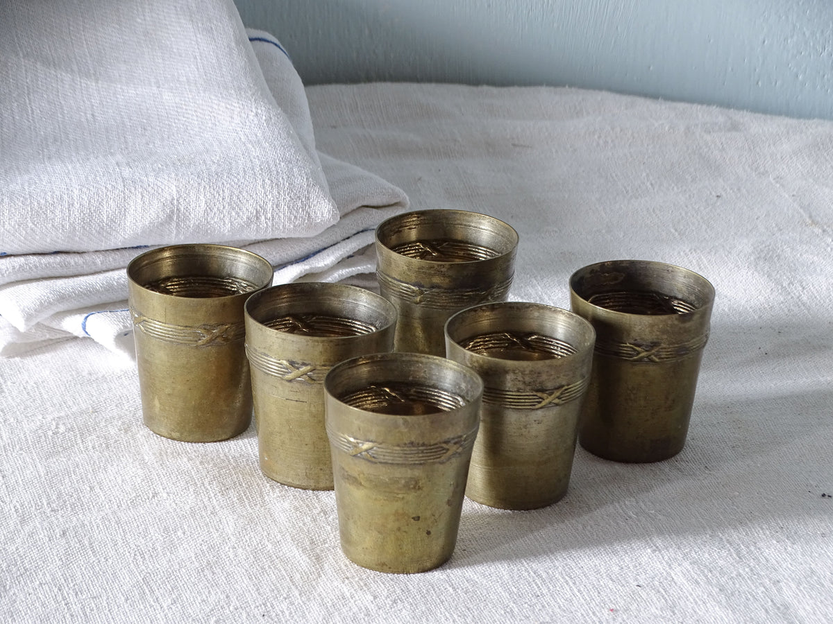 French antique silver plated aperitif cups, pictured alongside antique linen on country house table