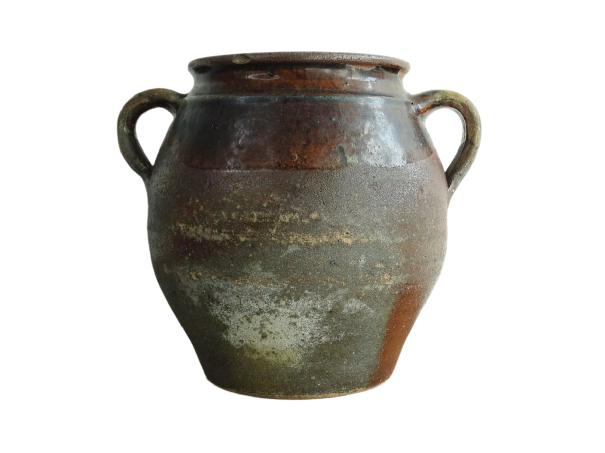 French antique earthenware vessel or confit pot in shades of brown with two handles