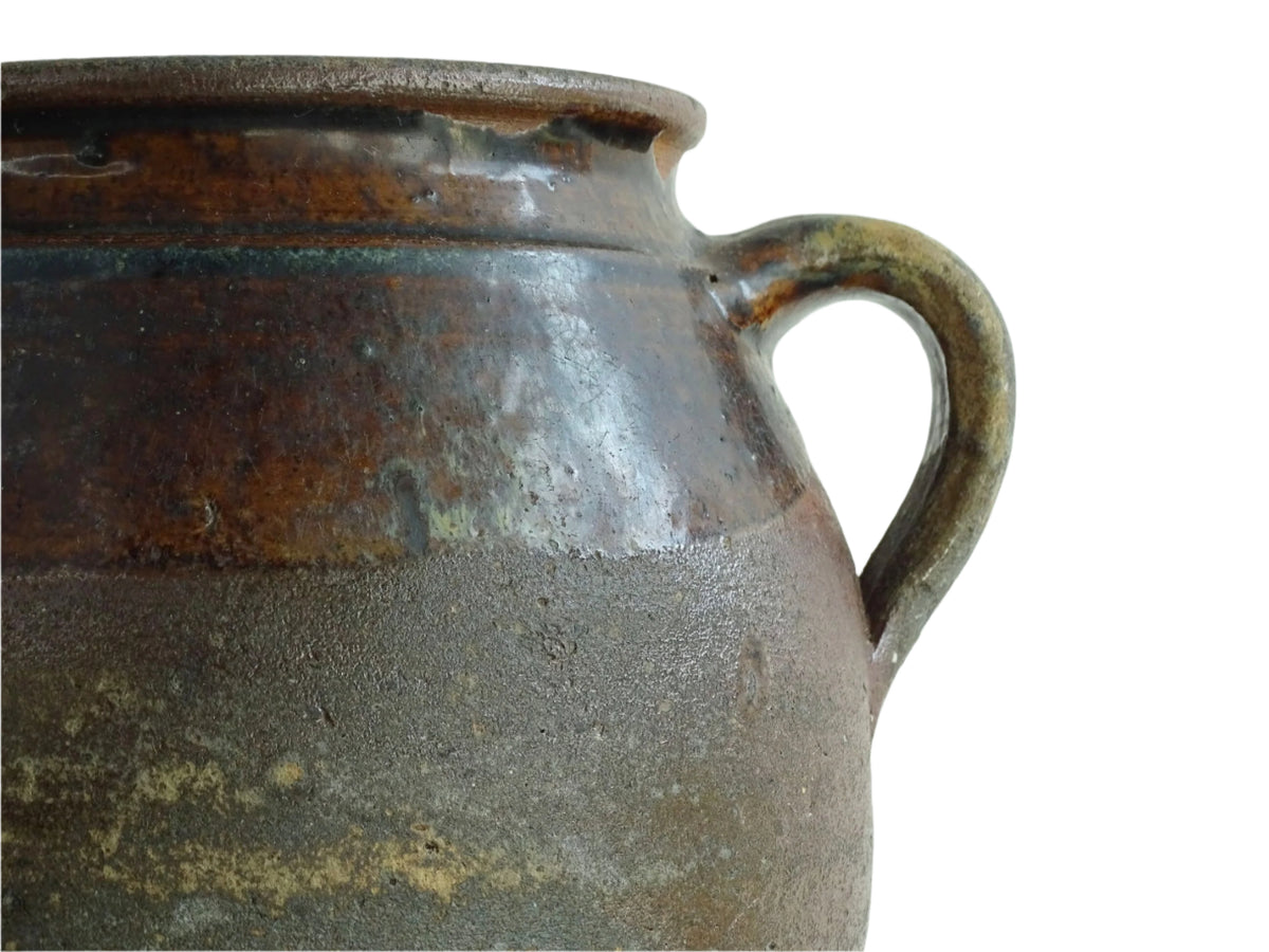 French antique earthenware vessel or confit pot in shades of brown with two handles