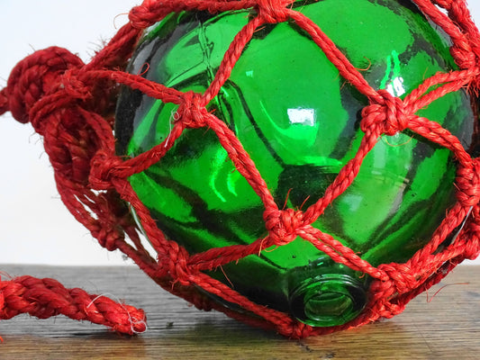 French vintage glass fishing float in green glass