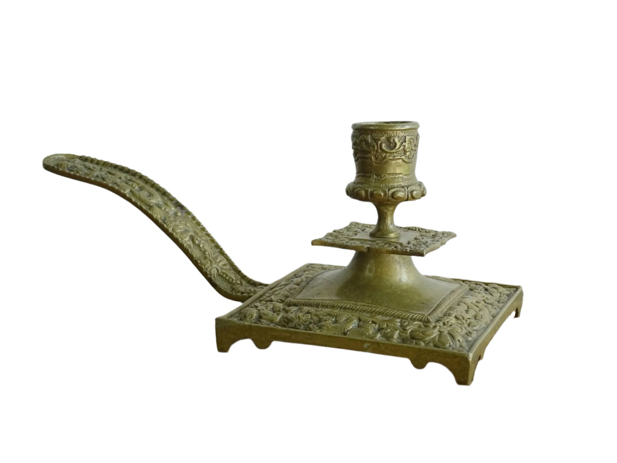 French antique brass candle holder or chamberstick with handle.
