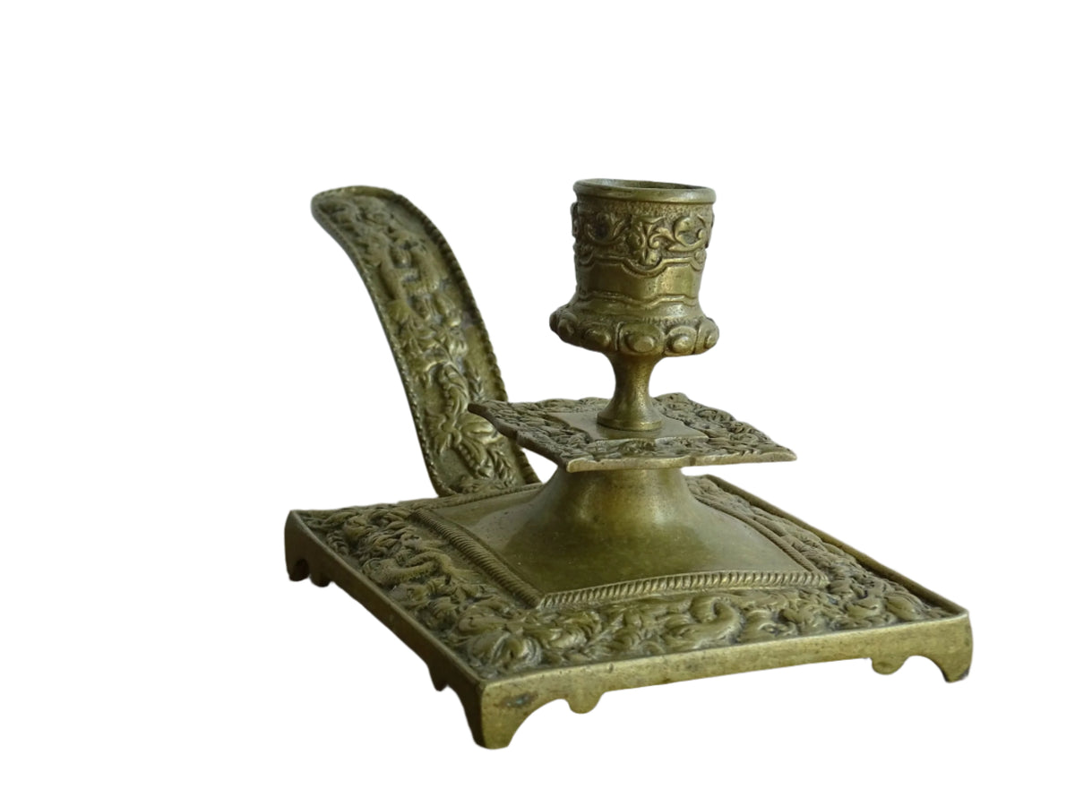 French antique brass candle holder or chamberstick with handle.