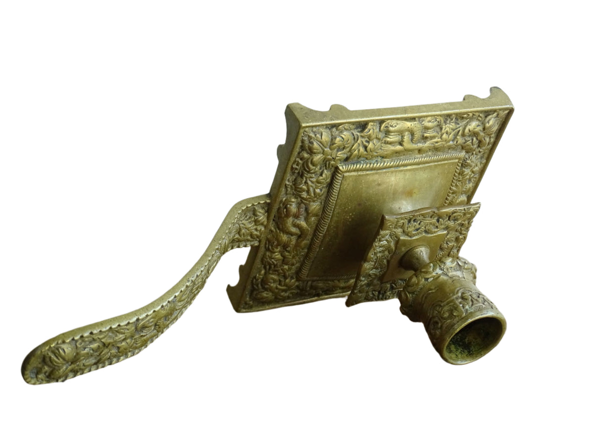 French antique brass candle holder or chamberstick with handle.