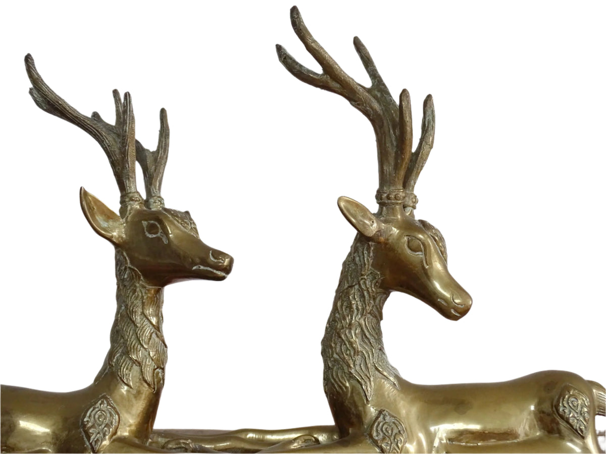 Pair of vintage brass deer figurines. Brass deer ornaments with nice detailing for vintage table decor.