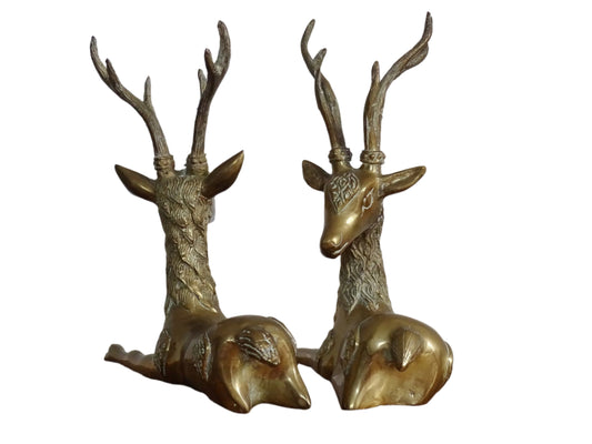 Pair of vintage brass deer figurines. Brass deer ornaments with nice detailing for vintage table decor.