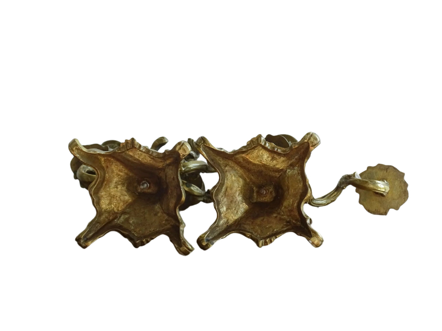 Pair of French antique brass candelabras in a rococo style. Early 20th century antique candelabras with space for two tapered candlesticks. Brass candle holders for dining table decor or living room decor.