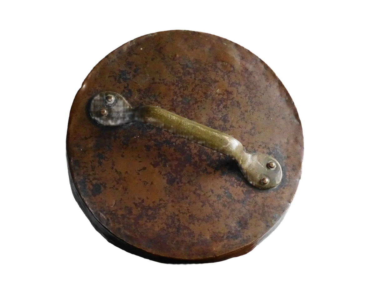 Large antique French copper cauldron with wrought iron handle, lid and rounded base. French farmhouse kitchen decor.