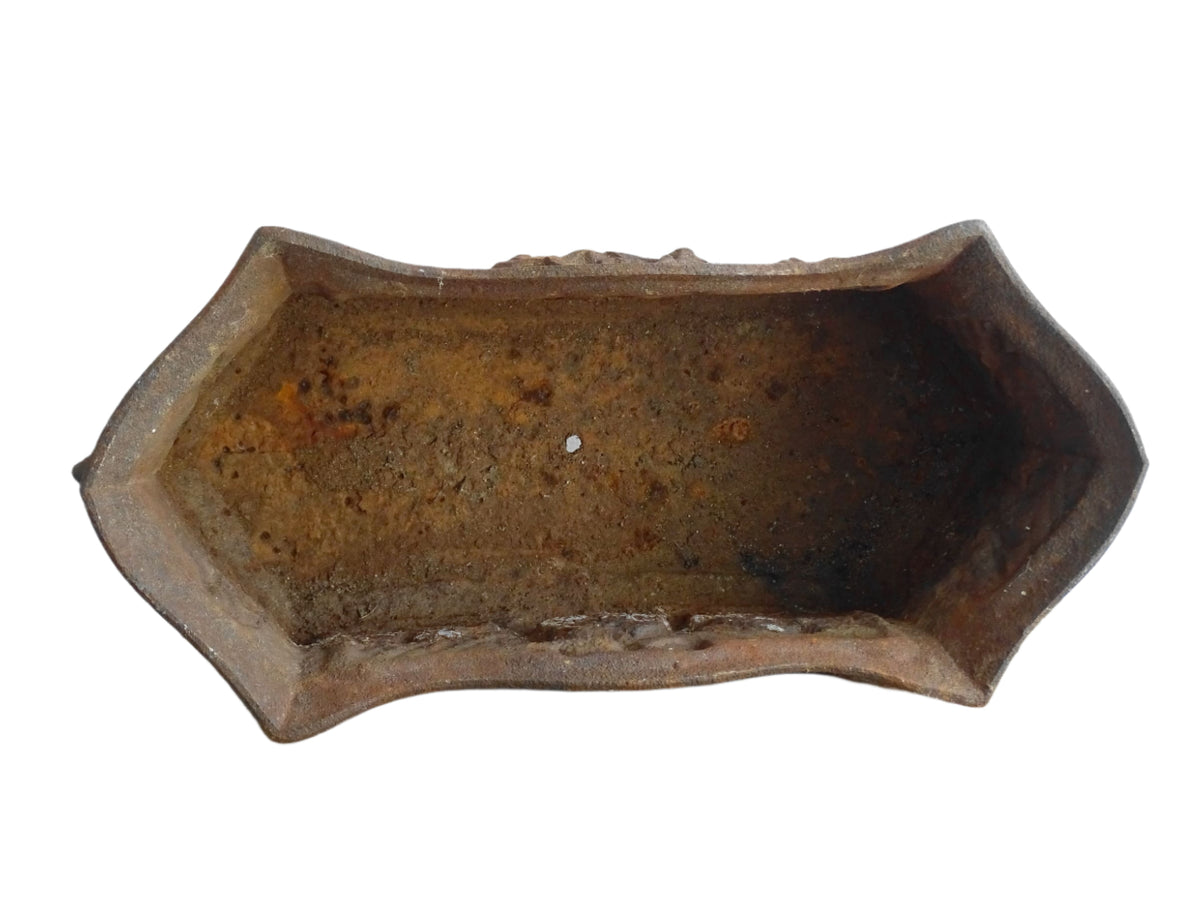 Antique French cast iron jardiniere or antique planter, 19th century, with a gorgeous patina. It is on four feet and has a wreath and ribbon motif decorating it. French outdoor decor.