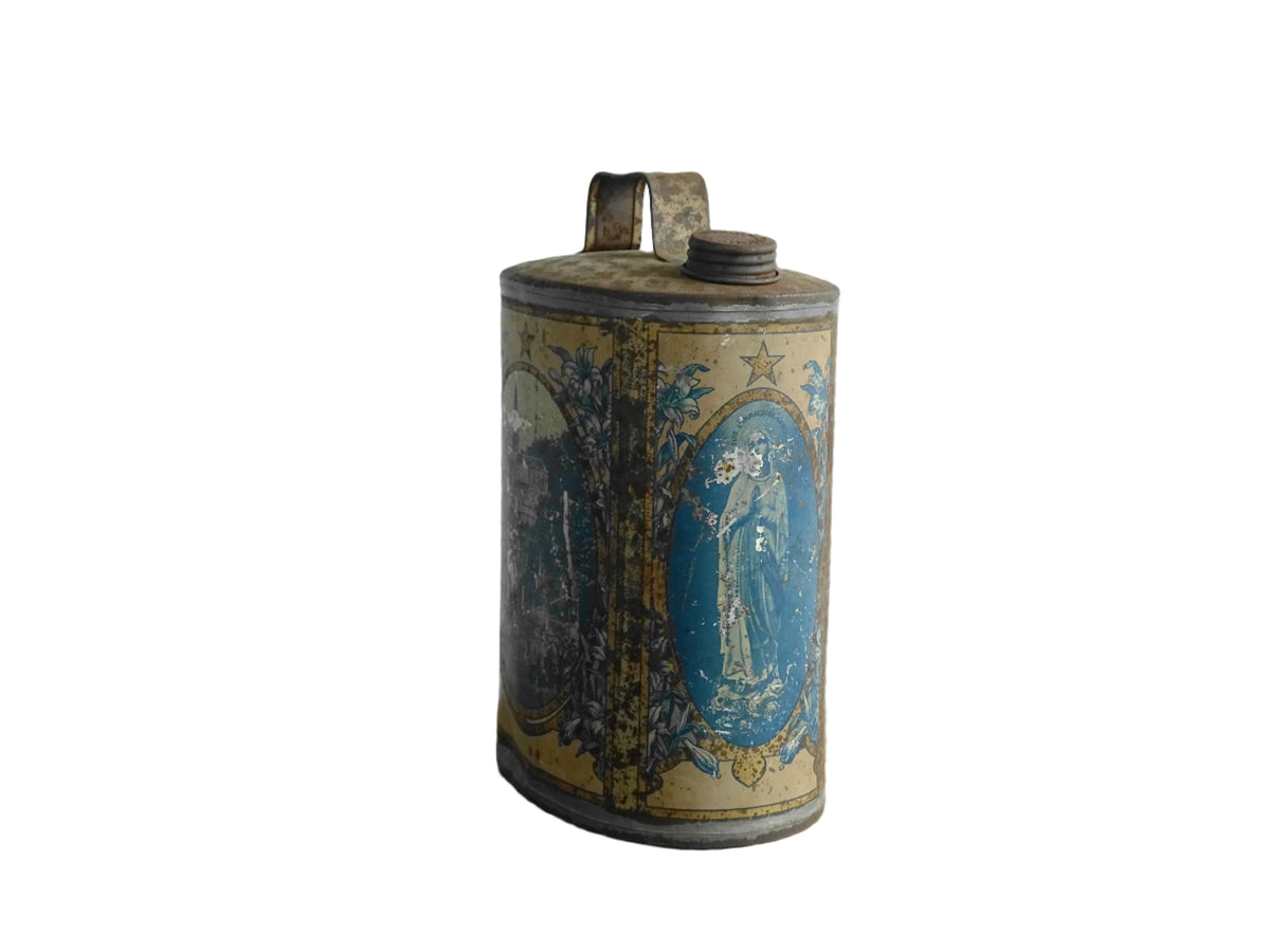 French antique Lourdes souvenir water flask. Pewter tin where the top is decorated with fleur de lis, one side depicts the cathedral (Sanctuaire de Notre-Dame de Lourdes), the other shows a crowd of people. To the side is the Virgin Mary, above her it says “Je suis l'Immaculée Conception”. The antique flask for religious decor.