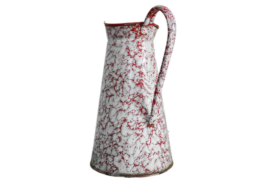 Large French vintage red and white enamelware pitcher with a large handle and spout. Tall enamel jug for farmhouse table