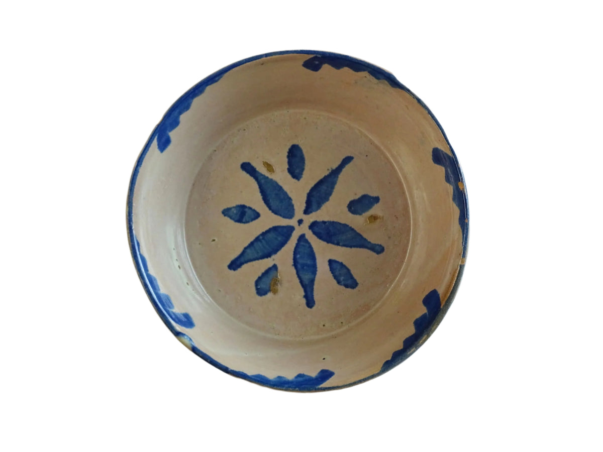 Spanish antique Fajalauza ceramic lebrillo from Granada. Terracotta ottery bowl with a pink tone and hand-painted blue star-shaped flower. Deep bowl for antique wall. Antique Mediterranean decor, decorative bowl.