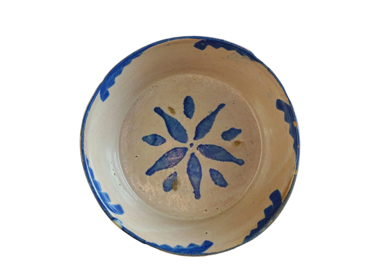 Spanish antique Fajalauza ceramic lebrillo from Granada. Terracotta ottery bowl with a pink tone and hand-painted blue star-shaped flower. Deep bowl for antique wall. Antique Mediterranean decor, decorative bowl.