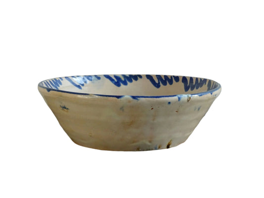 Spanish antique Fajalauza pottery lebrillo from Granada. Tin glazed terracotta bowl, hand-painted with blue leaves and flowers.