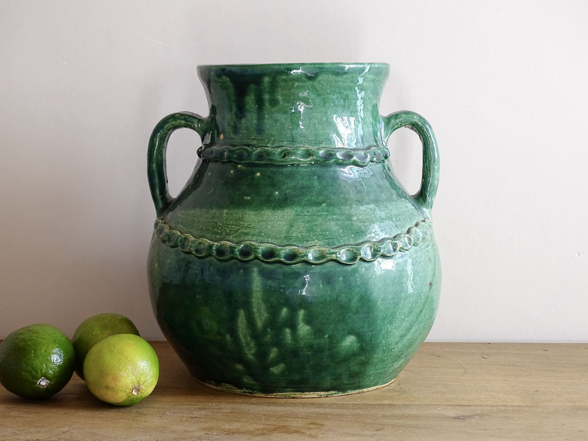Large Vintage Beauronne Pottery Vase with Green Glaze. Baluster shape with two handles and applied design.