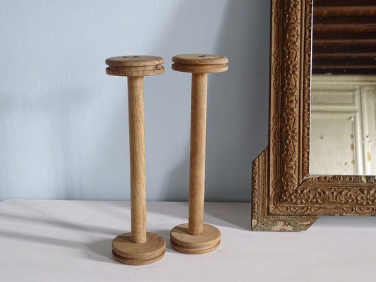Pair of vintage wooden bobbins with patina