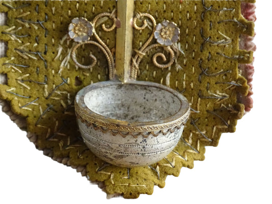French antique cross with benitier on a stitched felt background, backed by silk. It has small gilt metal flowers adorning the cross and above the basin (benitier). Religious decor for the wall.