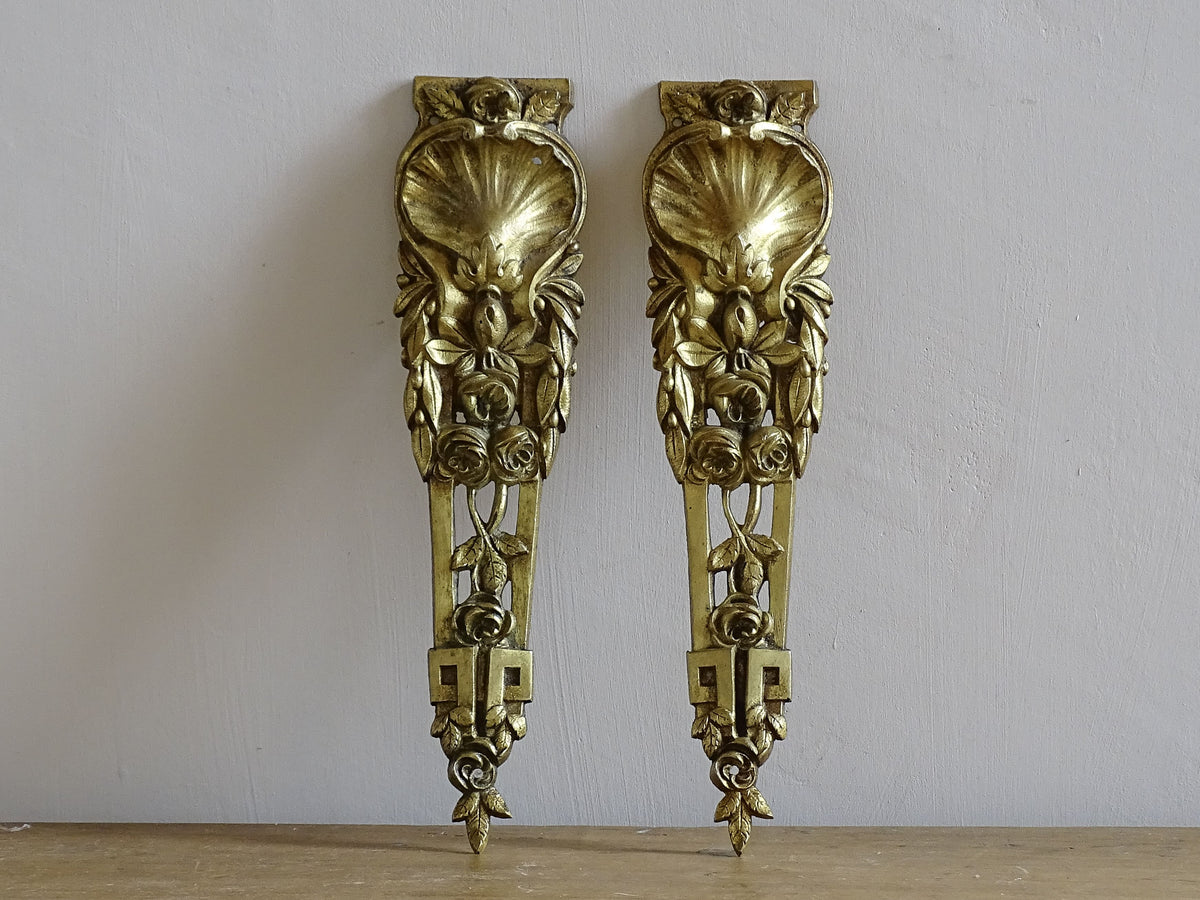 Pair of French antique furniture pediments in gilt bronze. Highly decorative antique ormolu embellishments.