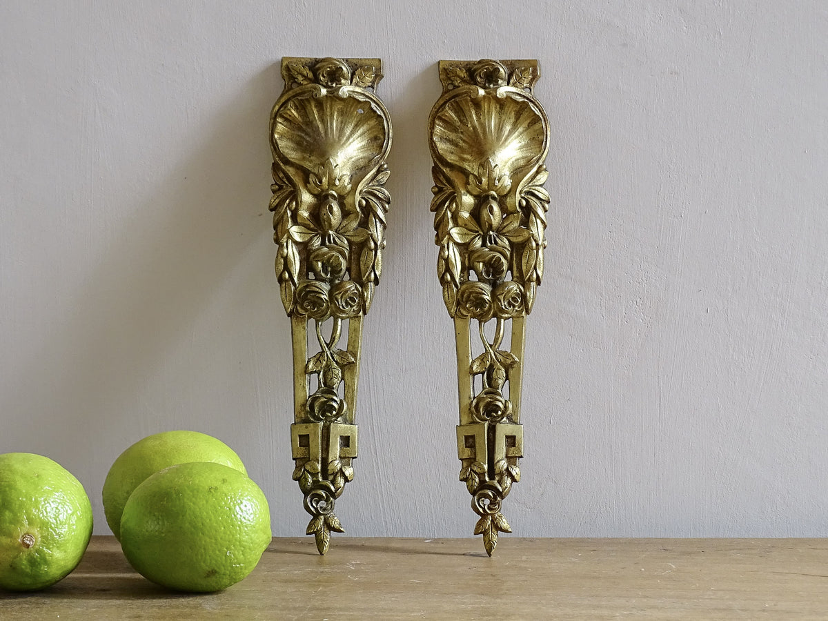 Pair of French antique furniture pediments in gilt bronze. Highly decorative antique ormolu embellishments.