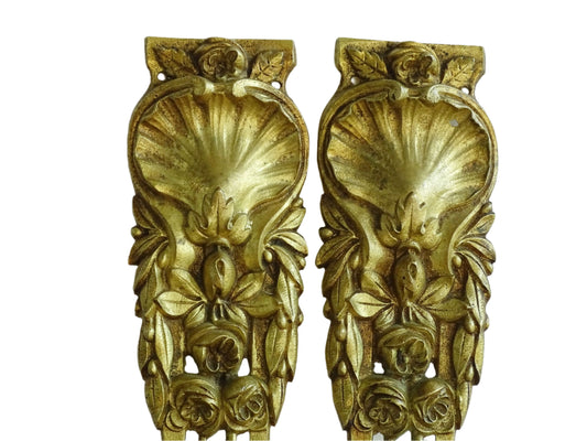 Pair of French antique furniture pediments in gilt bronze. Highly decorative antique ormolu embellishments.
