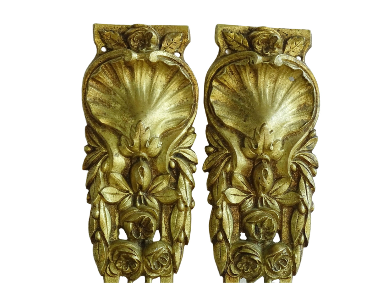 Pair of French antique furniture pediments in gilt bronze. Highly decorative antique ormolu embellishments.