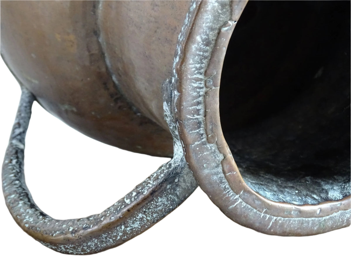 A large 18th-century antique copper water pot from Normandy with a rounded form and double handles, showcasing a warm aged patina