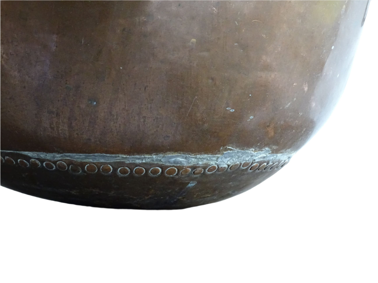 French Antique Copper Bowl for Confectioners 18th C. This timeworn copper mixing bowl has a rolled top and copper rivets to the curved base.