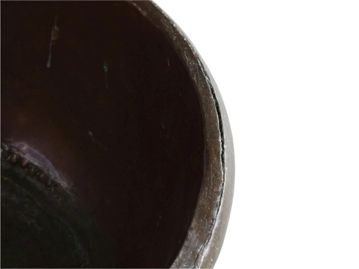 French Antique Copper Bowl for Confectioners 18th C. This timeworn copper mixing bowl has a rolled top and copper rivets to the curved base.