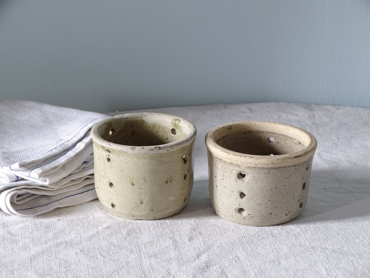French antique ceramic faisselle cheese strainers with a pale grey glaze