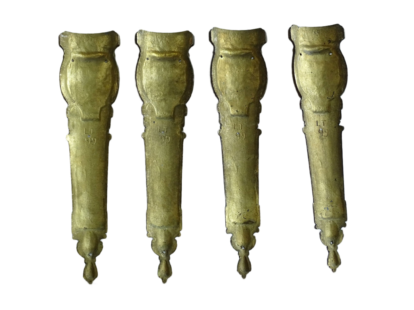Set of four French antique furniture pediments in gilt bronze adorned with leaves and scrolls. Furniture leg pediments. Ormolu furniture embellishments.