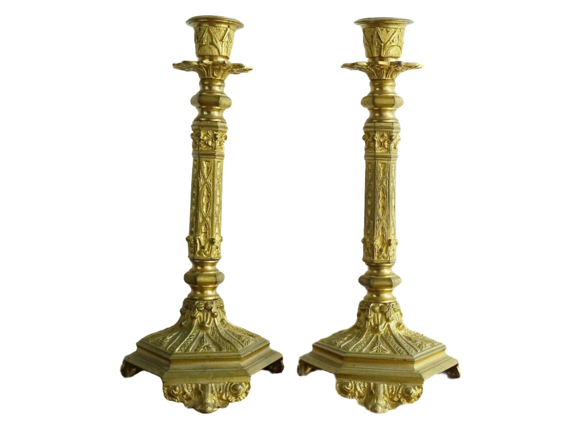 Antique French Ormolu Candlesticks from the 19th century, these antique candlesticks add a touch of French decor to your home.