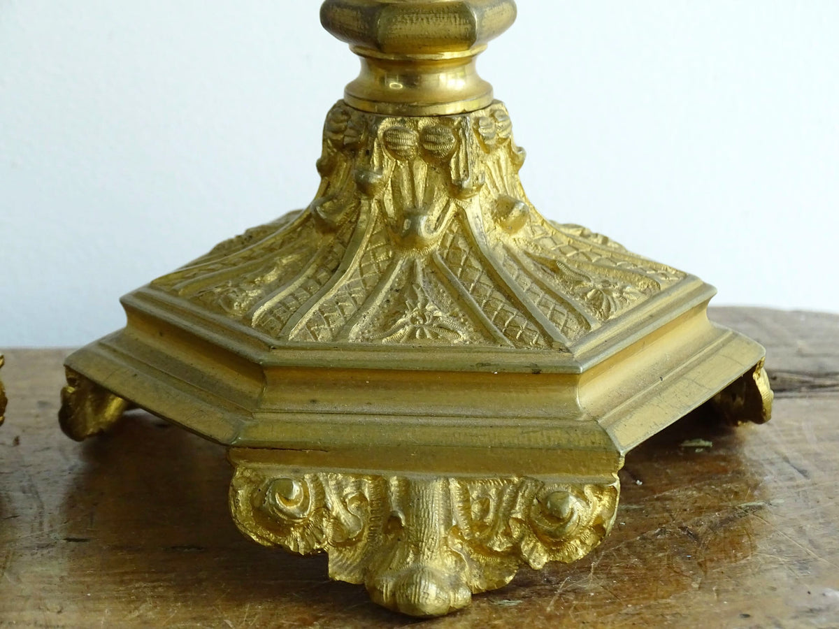 Antique French Ormolu Candlesticks from the 19th century, these antique candlesticks add a touch of French decor to your home.