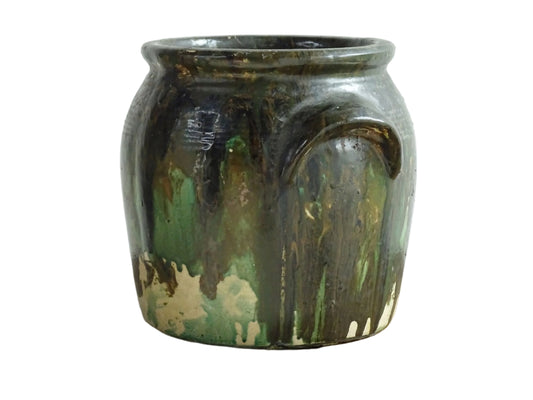 French antique stoneware pot with a green drip paint over earthy base tones. Confit pot for rustic farmhouse decor.