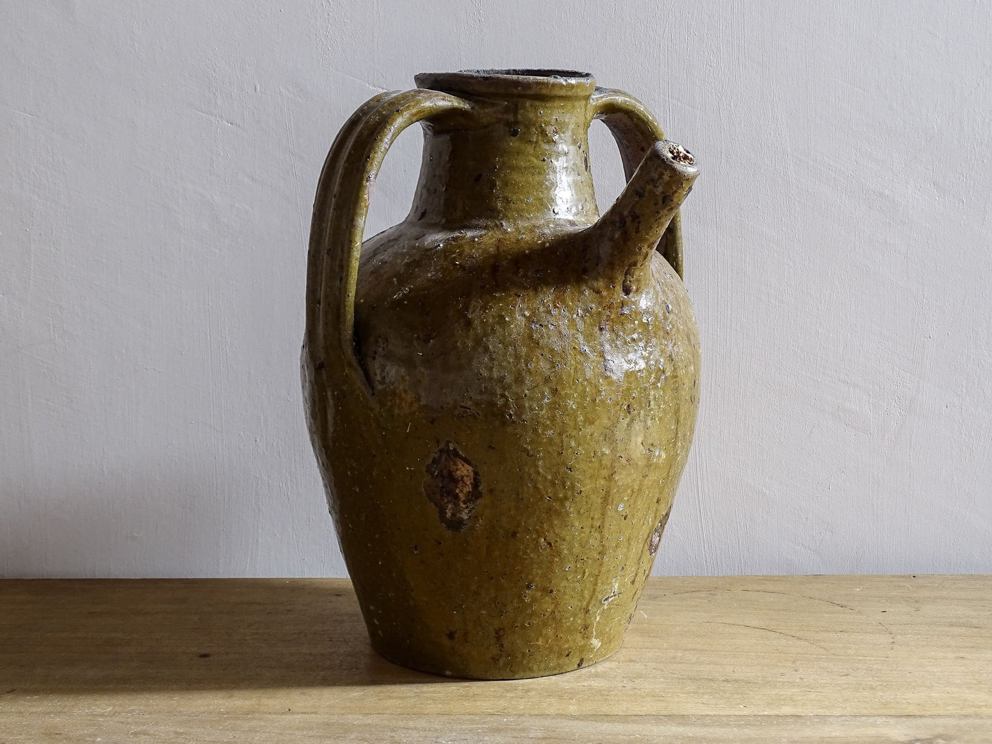 French antique walnut jug with green glaze and two handles with large spout
