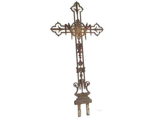 French antique cast iron field cross. Aged and rusted antique pilgrim cross decorated with grapes and vines.