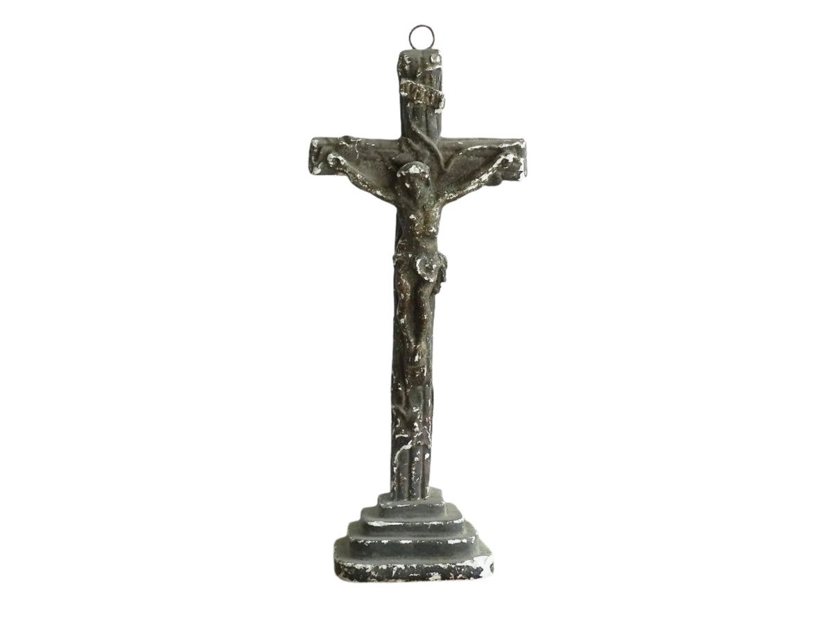 Timeworn French antique altar cross in plaster with a hook on the top so it. Antique altar crucifix as religious decor.
