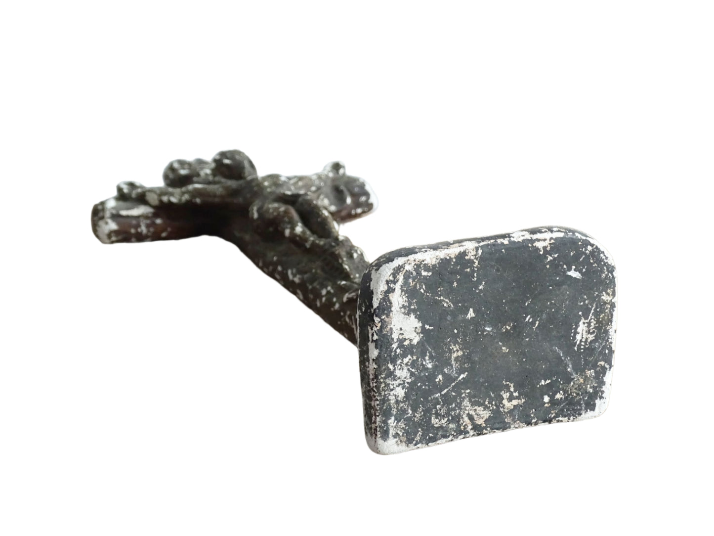 Timeworn French antique altar cross in plaster with a hook on the top so it. Antique altar crucifix as religious decor.