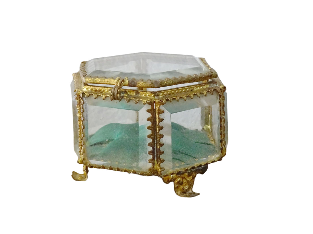 French antique glass jewelry box with bevelled glass, green silk cushion and gilt detailing