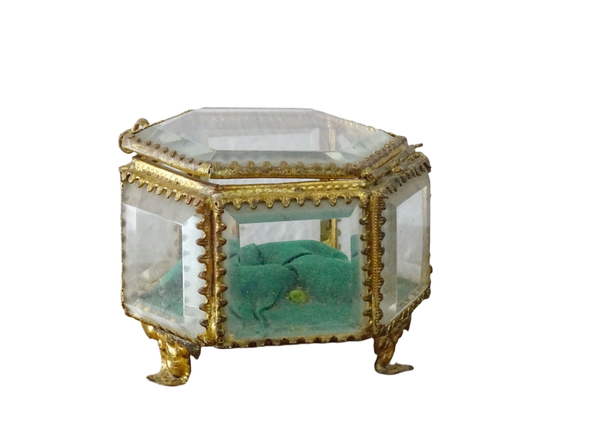 French antique glass jewelry box with bevelled glass, green silk cushion and gilt detailing