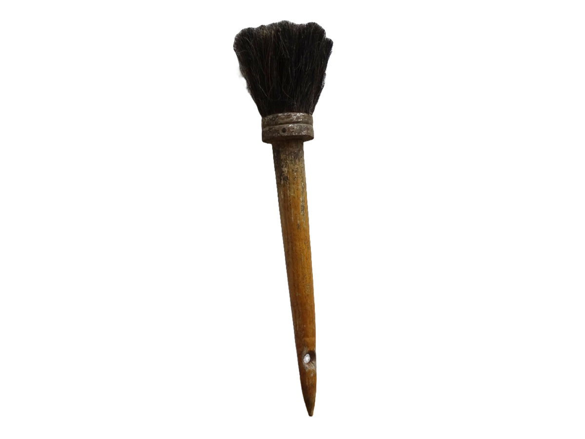 French antique paint brush with horse hair bristles and a patinated wooden handle. Art studio decor.
