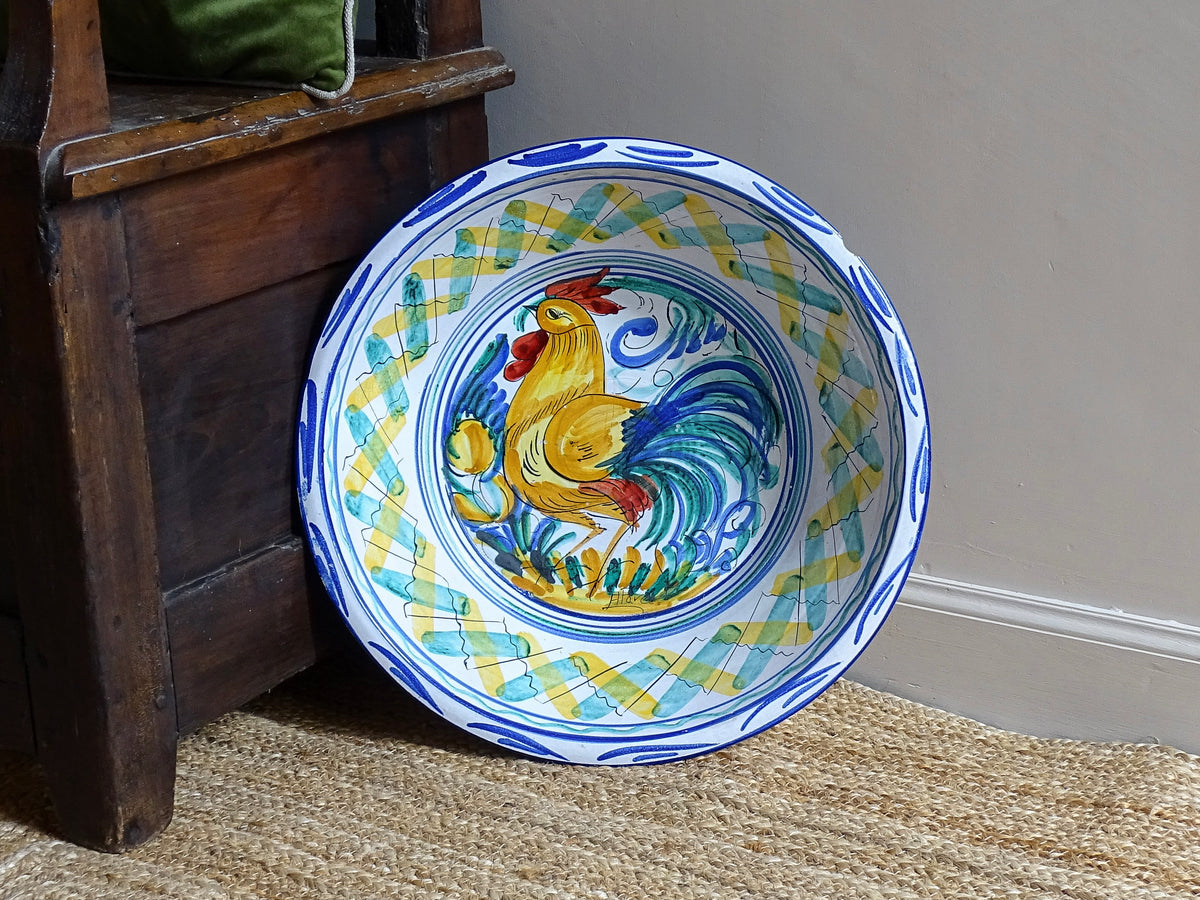 Large Vintage Spanish Triana Pottery Lebrillo with Hand-painted Cockerel Motif in Blue, Green, Yellow and Red. Tin glazed earthenware bowl.