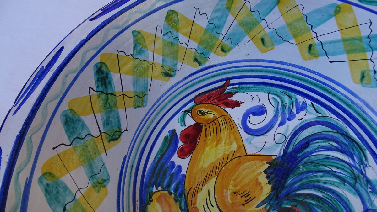 Large Vintage Spanish Triana Pottery Lebrillo with Hand-painted Cockerel Motif in Blue, Green, Yellow and Red. Tin glazed earthenware bowl.