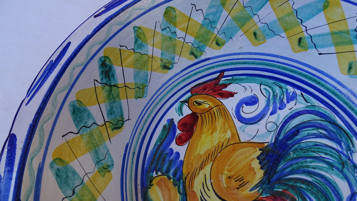 Large Vintage Spanish Triana Pottery Lebrillo with Hand-painted Cockerel Motif in Blue, Green, Yellow and Red. Tin glazed earthenware bowl.