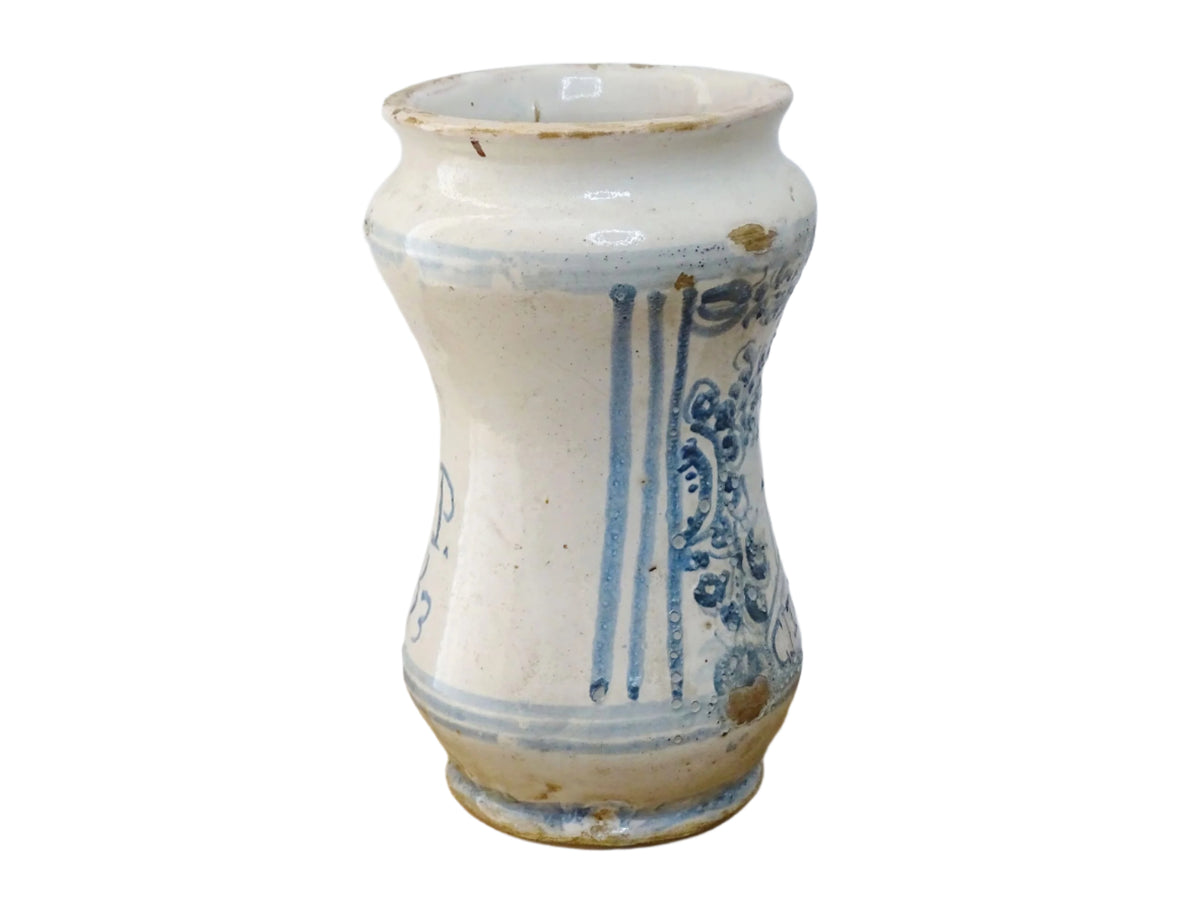 Italian albarello medicine jar from the 18th century, a tin-glazed, blue and white earthenware jar hand-painted with flowers, foliage and a naive house, dated 1763