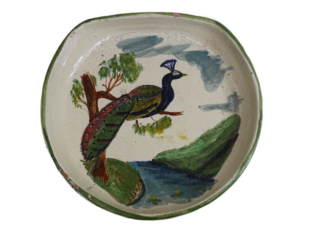French antique glazed terracotta bowl, with hand-painted green highlights and a peacock motif to the centre. The pottery bowl is flat to the top, it is a decorative bowl for the coffee table or as wall decor.