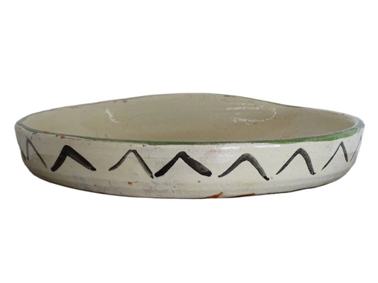 French antique glazed terracotta bowl, with hand-painted green highlights and a peacock motif to the centre. The pottery bowl is flat to the top, it is a decorative bowl for the coffee table or as wall decor.