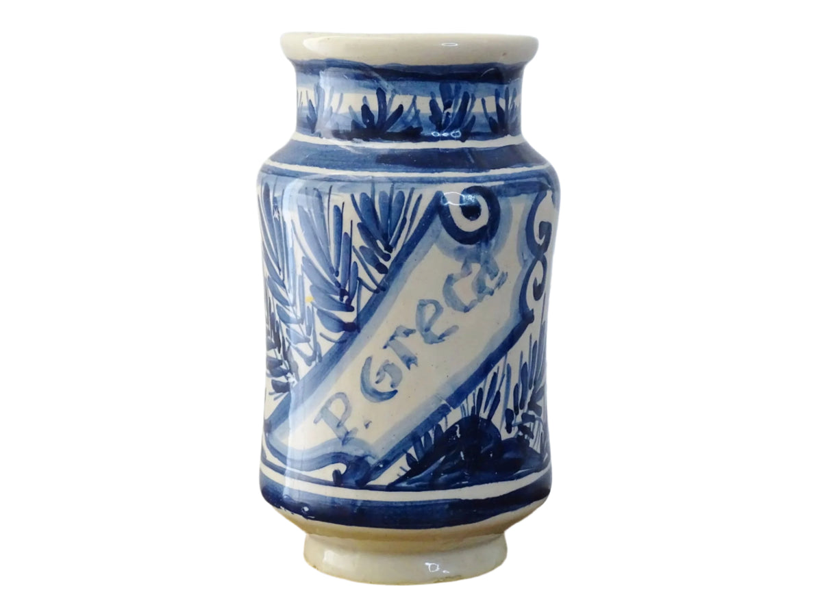 a vintage Spanish Catalan Albarello Pottery Pharmacy jar it is tin-glazed and hand-painted in blue and white