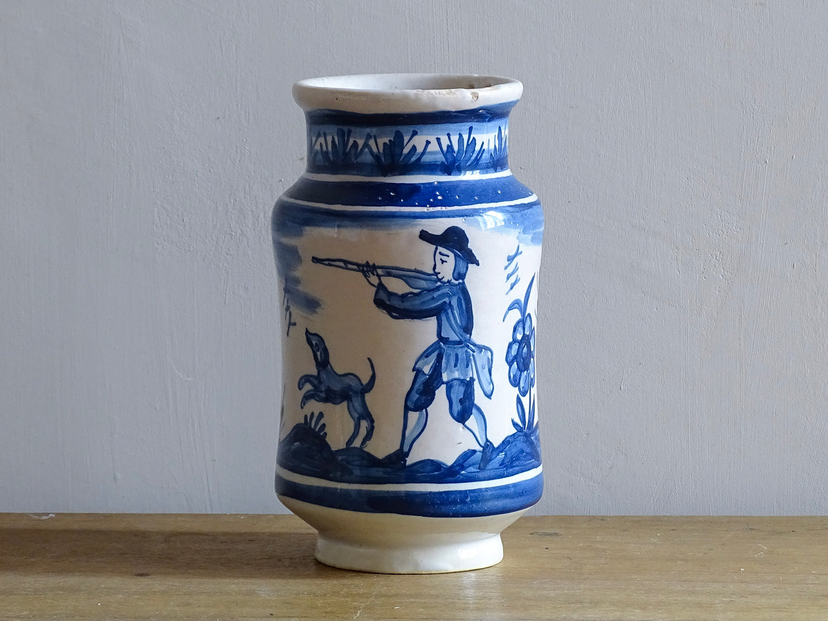 a vintage Spanish Catalan Albarello Pottery Pharmacy jar it is tin-glazed and hand-painted in blue and white