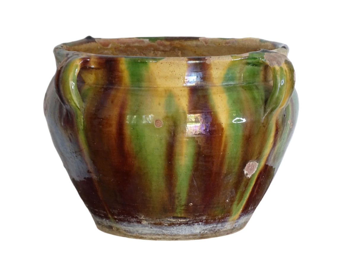 French antique terracotta planter with a stripe drip glaze in yellow, green and brown . Pottery planter from Castelnaudary. Antique ceramic jardinière or ceramic cachepot.